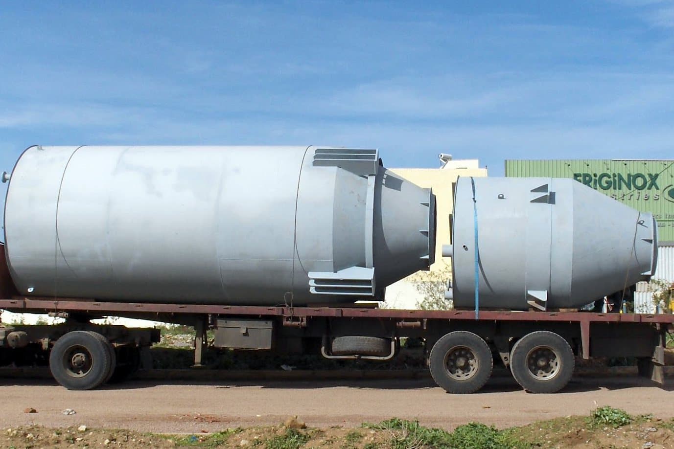 Two storage silos leaving the Friginox plant on a trailer